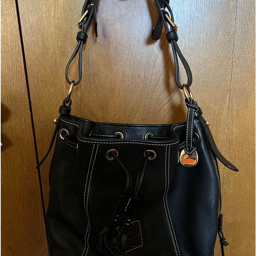 Black purse with gold hardware, good condition.